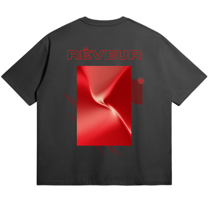 Oversized black streetwear t-shirt “RED SHIFT” by RÊVEUR — minimalist artistic design featuring a red metallic abstract rectangle on the back.